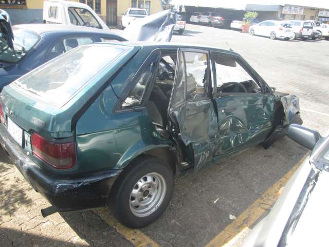 MAZDA , 323 HATCH , GREEN , XX ( 23075 ) - Sump