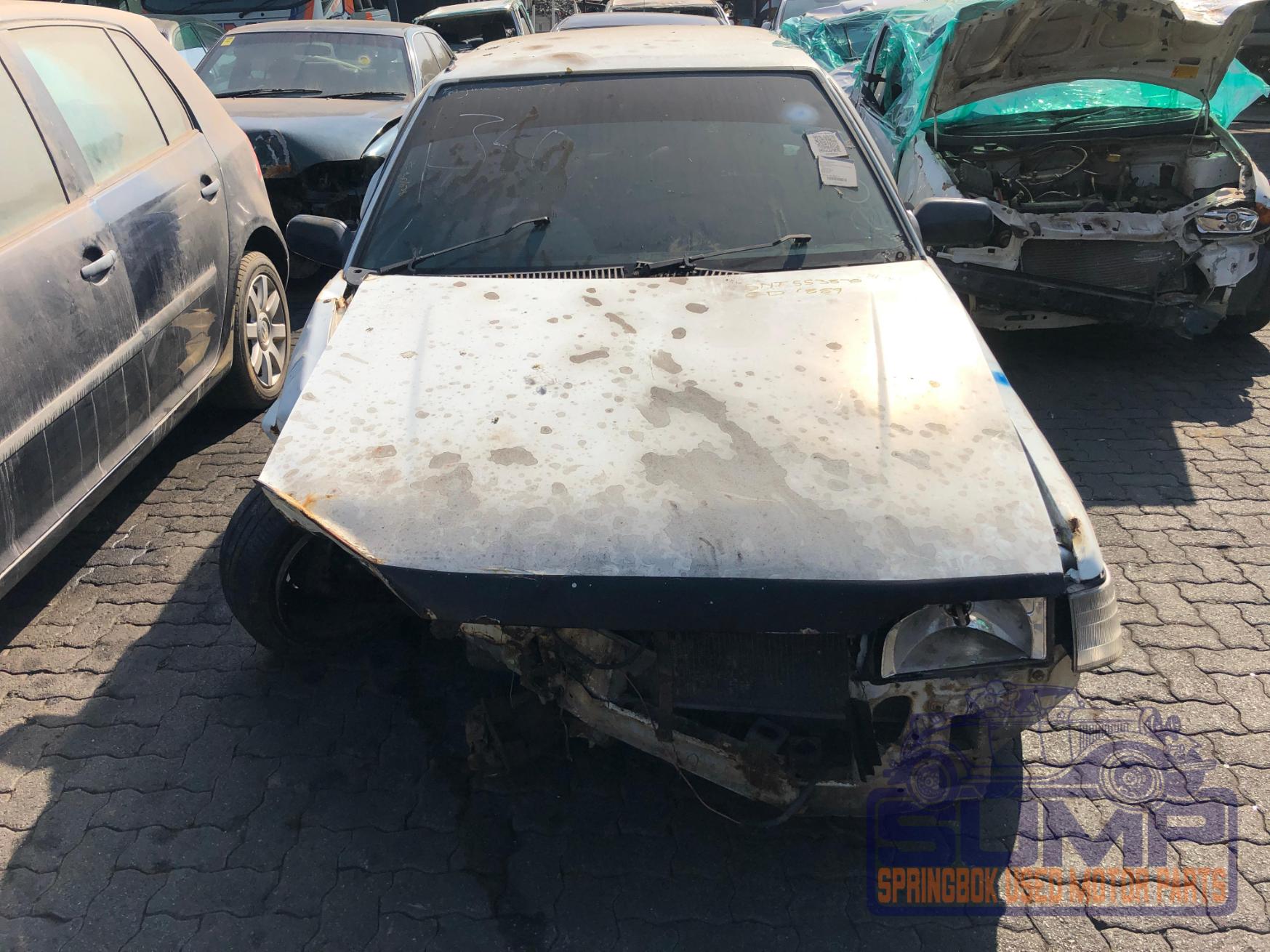 FORD , LASER TRAER 1 . 3 HB , WHITE , 1996 ( 30030 ) - Sump